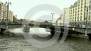 Cityscape and Weidendammer Bridge on Spree river in Berlin city, Weidendammer Brcke, tourist ships on the river Spree