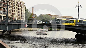 Cityscape and Weidendammer Bridge on Spree river in Berlin city, Weidendammer Brcke, tourist ships on the river Spree