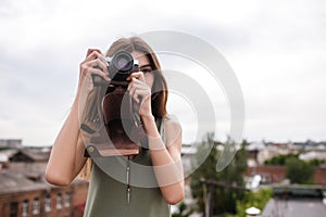 Cityscape woman photoshoot roof concept