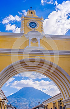 Ciudad de Guatemala, Guatemala, April, 25, 2018: The famous arch of the city center of Antigua together with agua