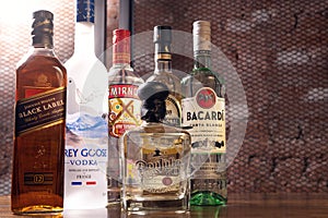 CIUDAD DE MEÃÂXICO, MEXICO - SEPTEMBER 14, 2020- Famous bottles of alcoholic beverages on the bar table. The most popular liquor