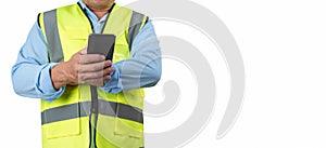 Civil engineer architect Using a smartphone to communicate and give orders to the construction team, Engineer building concept,