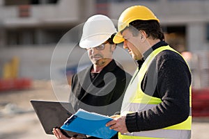 Foreman at work with a construction worker
