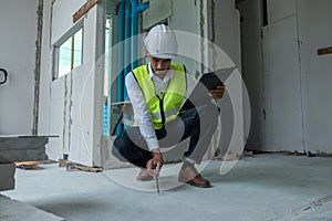 Civil engineer is inspecting in building site