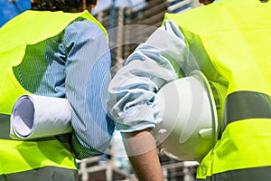 Civil engineers visiting building site