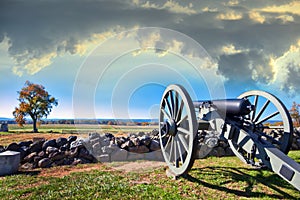 Civil War canon on the Gettysburg battlefield in Autumn near sun