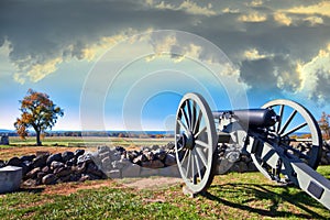 Civil War canon on the Gettysburg battlefield in Autumn near sun photo