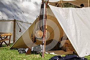 Civil war soldier sleeps in a canvas tent