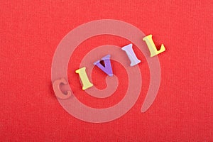 CIVIL word on red background composed from colorful abc alphabet block wooden letters, copy space for ad text. Learning english