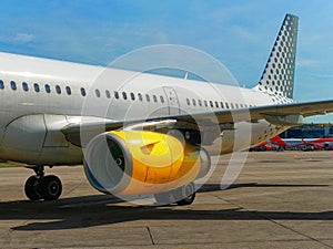 Civilian airplane at ground in the airport