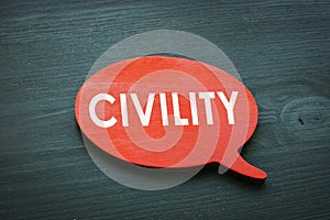 Civility concept. Red quote plate from wood.