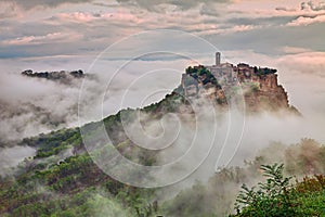 Civita di Bagnoregio, Viterbo, Lazio, Italy: landscape at dawn with fog