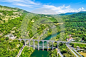 The Cize-Bolozon viaduct across the Ain river in France photo