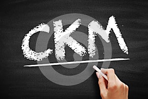 CKM Customer Knowledge Management - emerges as a crucial element for customer-oriented value creation, acronym text on blackboard