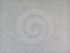 Cracked white plastic.