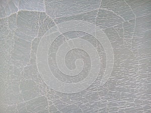 Cracked white plastic.