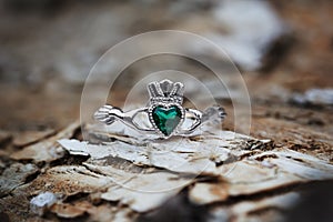Claddagh ring with emerald heart photo