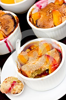 Clafoutis with raspberry jam and peach slice