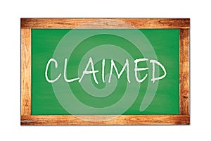 CLAIMED text written on green school board
