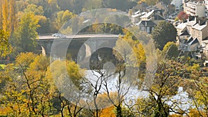 Clain river and old bridge in Poitiers.