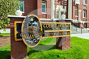 The Clallam County Courthouse Restoration Wood Carved Sign in Port Angeles, Washington, USA