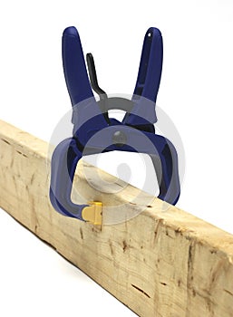 Clamp holding wood