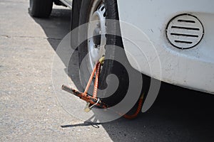 Clamped vehicle, wheel locked