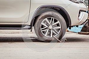 Clamped Wheel, Car Locked by Police for Prohibit Park.