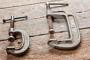 Clamps tool equipped at a carpenter`s work bench