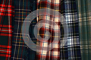 Clan tartan or plaid kilts in assorted colors