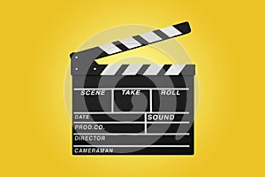 clapperboard isolated on yellow