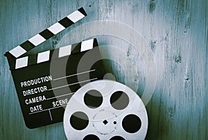 Clapperboards and the reel of film