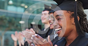 Clapping, campus or happy graduates in ceremony or gowns standing in a line outside together. Diversity, faces or proud