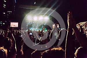 Clapping hands at concert