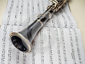 Clarinet lays over the book with notes