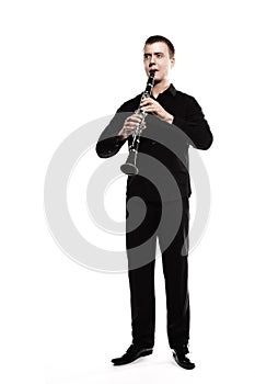 Clarinet player classical musician isolated on white. Clarinetist