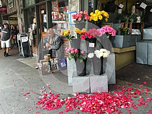 Clarinet player outside a flower shop near Pike Place Market, Seattle