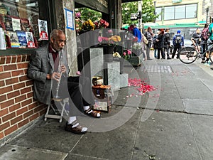 Clarinet player 2 outside a flower shop near Pike Place Market, Seattle