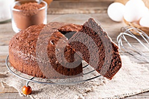 Clasic chocolate sponge cake, selective focus photo