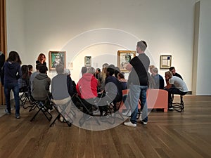 Teacher having art lesson in moderna museet in stockholm