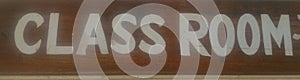 Class room sign logo on wood over door school