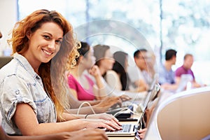 Class Of University Students Using Laptops In Lecture