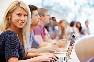 Class Of University Students Using Laptops In Lecture