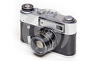 Classic 35mm old analog camera on white