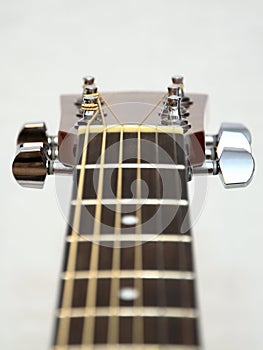 Classic acoustic guitar headstock: pegs, keys