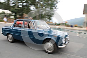 Classic alfa sedan fast on the move photo