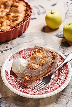 Classic American apple pie on linen tablecloth