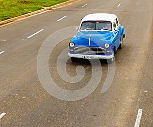 Classic American blue car one of streets in Havana, Cuba