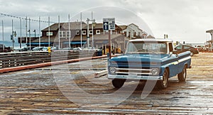 classic American brand pickup truck on the iconic Stearns Wharf, in Santa Barbara, California, USA