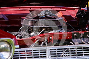 Classic american muscle car under hood